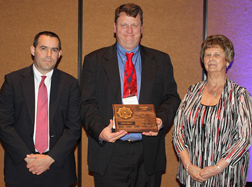 Needville insurance salesman honored